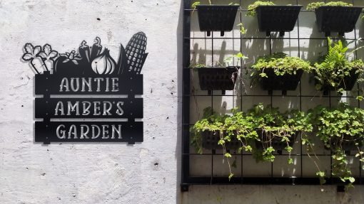 Custom veggie garden metal sign on a wall