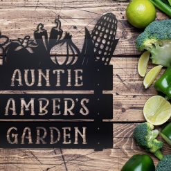 Personalized garden metal sign on a table with vegetables