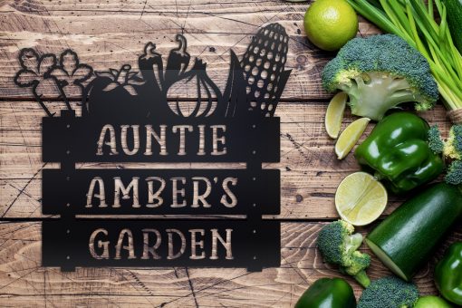 Personalized garden metal sign on a table with vegetables